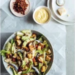 GRILLED ROMAINE CHICKEN CAESAR WITH AVOCADO