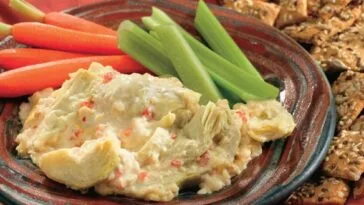 Creamy, irresistible Hot Artichoke Dip - the perfect party appetizer! This simple, healthy dip is always a hit and easy to make.